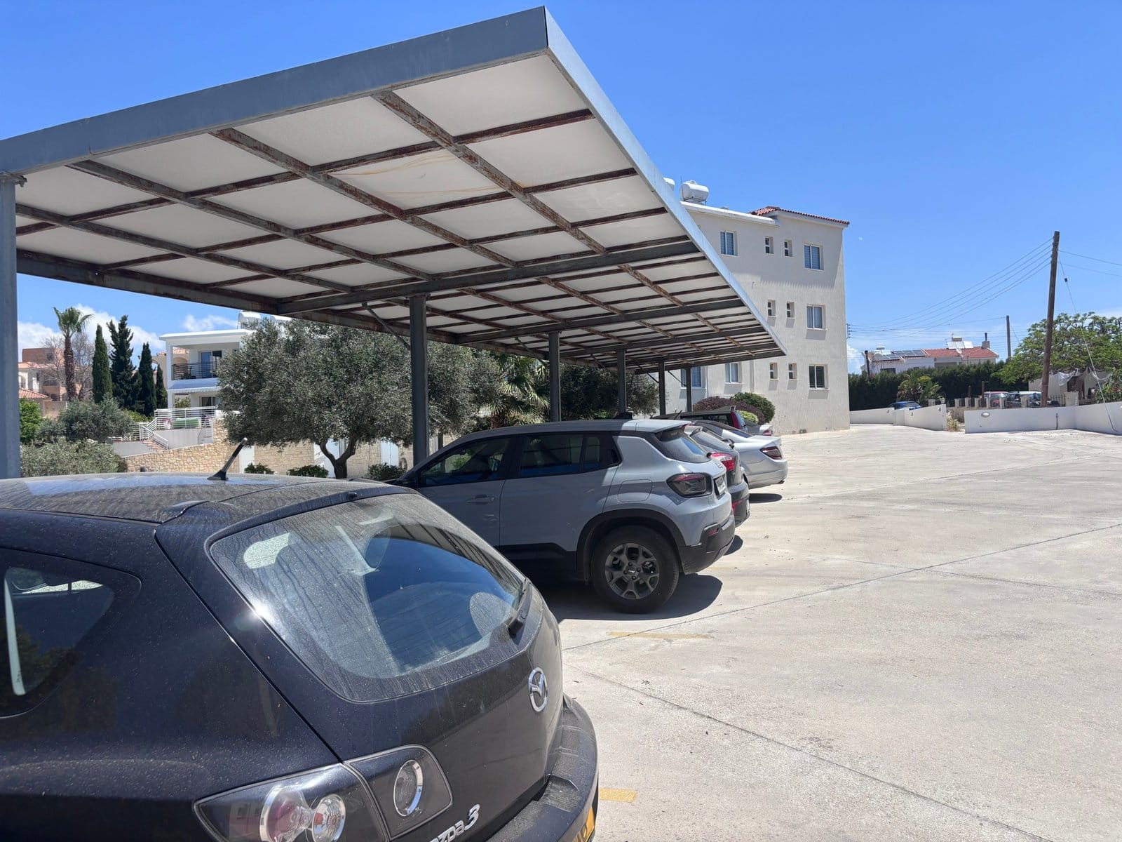 covered parking for 2 bedroom apartment in chloraka covered parking for 2 bedroom apartment in chloraka This exceptional 2-bedroom, 2-bathroom apartment is located in the sought-after coastal village of Chloraka on the west coast of Cyprus, offering stunning sea views and comfortable modern living just minutes from Paphos Harbour and local amenities. The property is presented in excellent condition and features a spacious open-plan living and dining area, a fully equipped kitchen, and two well-appointed bedrooms, including a master bedroom with en-suite bathroom. Large windows and a private balcony provide abundant natural light and uninterrupted views of the Mediterranean Sea. Residents benefit from a secure entrance system, lift access, and covered private parking, ensuring convenience, security, and peace of mind. Key Features: 2 spacious bedrooms 2 modern bathrooms Spectacular sea views Located in Chloraka, Paphos Lift access Secure entrance Covered private parking Excellent condition throughout Close to beaches, shops, restaurants, and public transport An ideal home for professionals, couples, retirees, or anyone seeking a high-quality coastal lifestyle in one of the most desirable areas of the Paphos district.